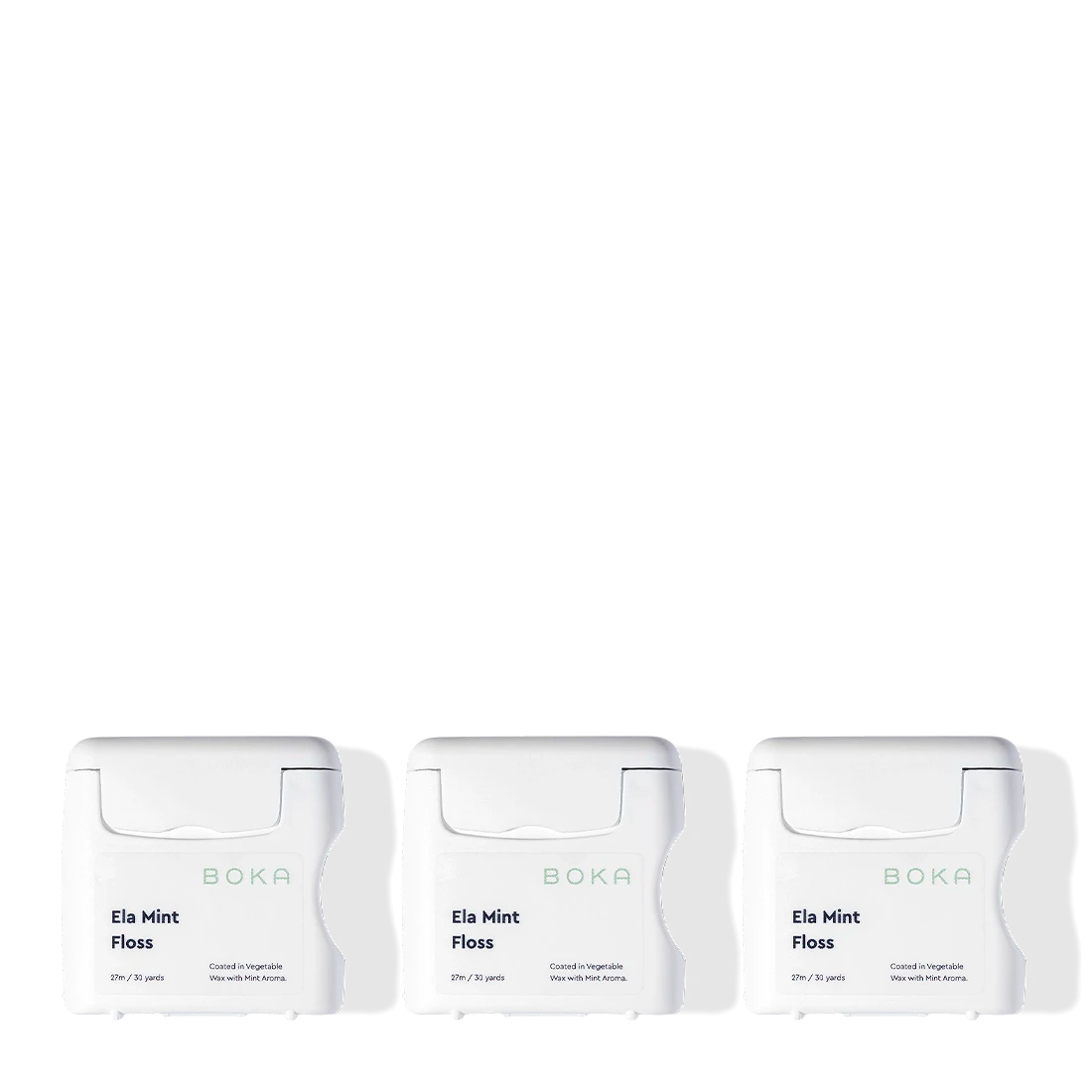 Three Boka Floss - Ela Mint containers, in white, are lined up on a plain background.