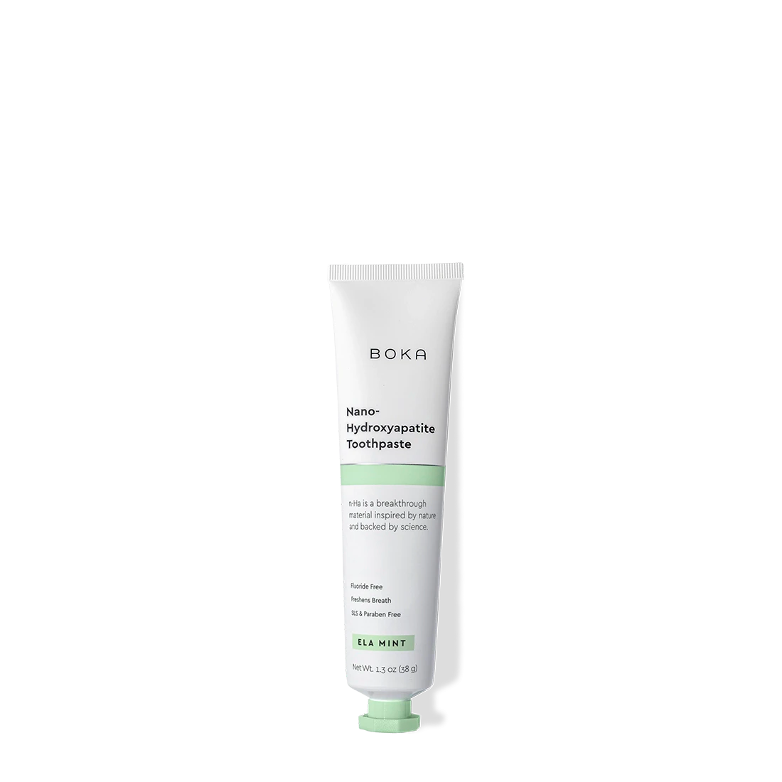 Tube of Ela Mint Travel Size n-Ha Toothpaste, a fluoride-free toothpaste, on black background.