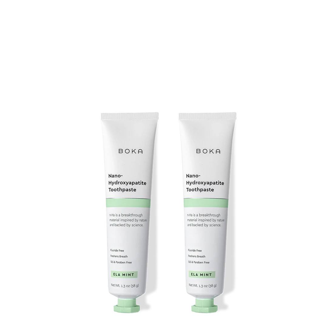Two tubes of Ela Mint Travel Size n-Ha Toothpaste stand upright on a plain background.