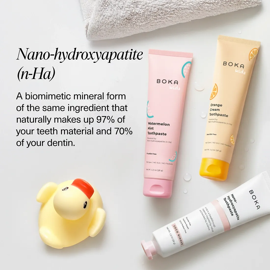 Boka toothpaste tubes with a rubber duck on a light background
