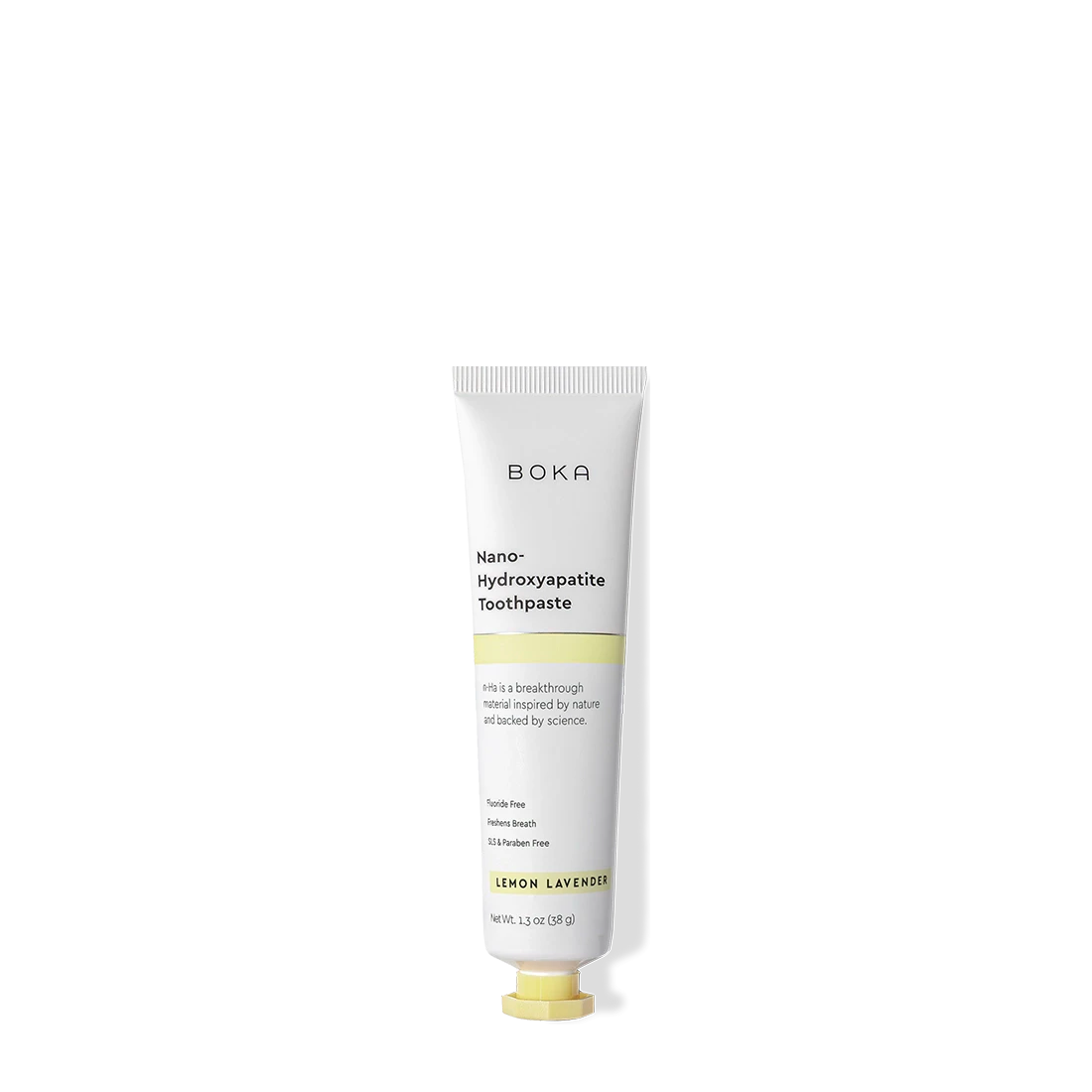 A white tube of Lemon Lavender Travel Size n-Ha Toothpaste on a black background.