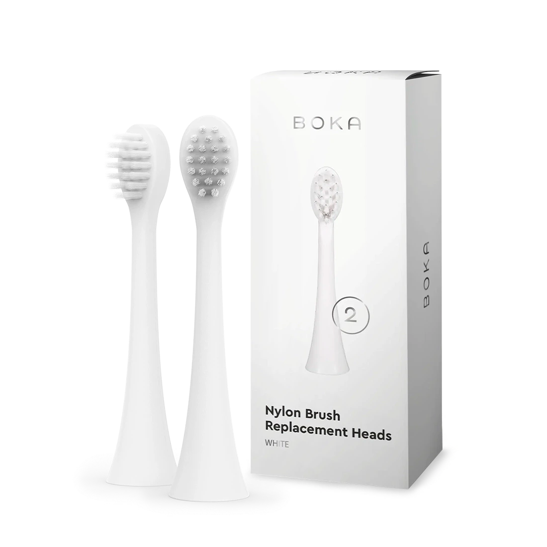 Two kids sonic toothbrush replacement heads stand beside a Boka replacement heads box.