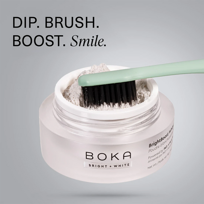 Boka Bright White powder with a brush on a gray background