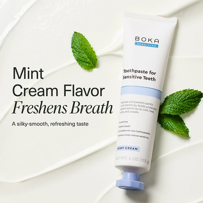 Boka Mint Cream toothpaste tube with mint leaves on a white background
