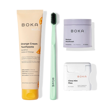 The Advanced Kit includes toothpaste safe for kids, green toothbrush, mouthwash tablets, and floss.