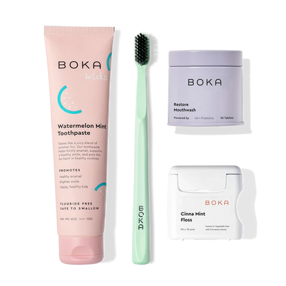 The Advanced Kit includes Boka toothpaste, a green toothbrush, mouthwash tablets, and cinnamon mint floss.