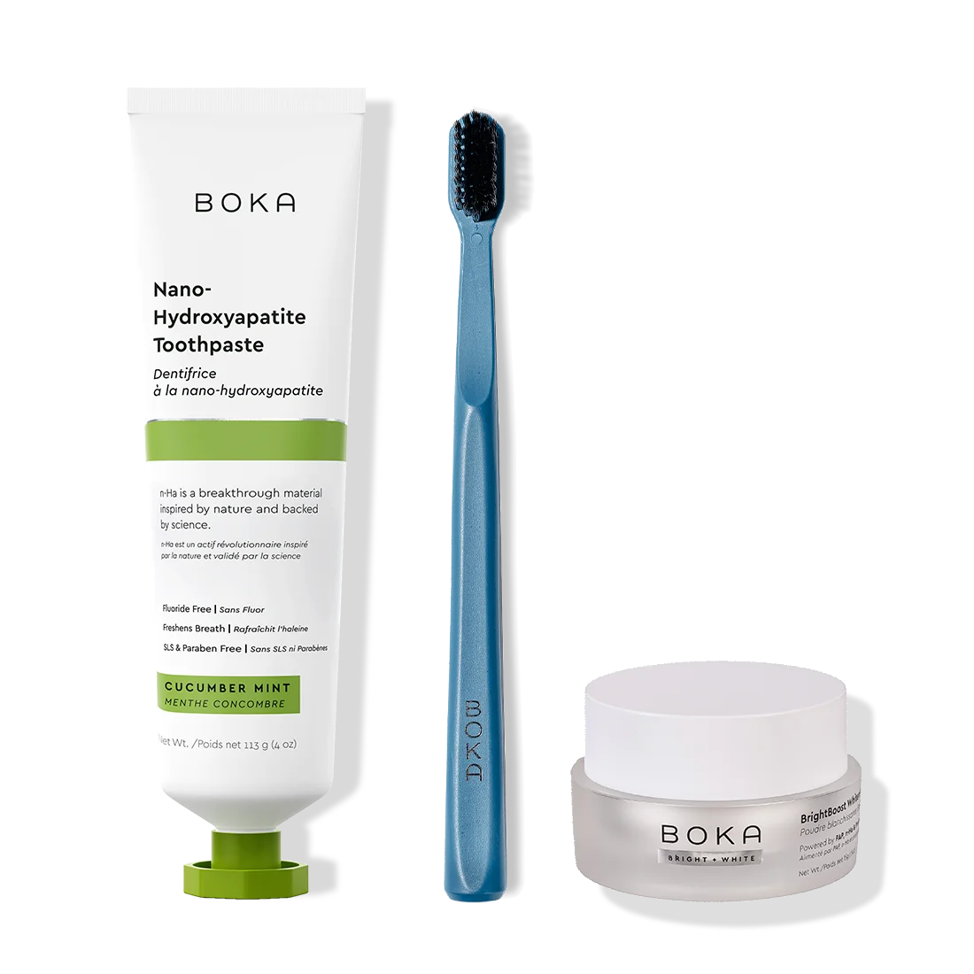 Boka toothpaste, toothbrush, and whitening powder on a white background