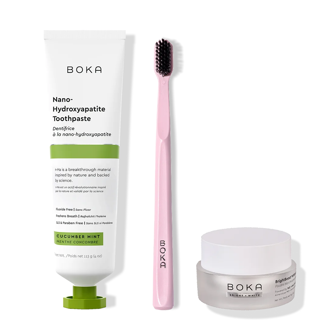 Boka toothpaste, toothbrush, and whitening powder on a white background
