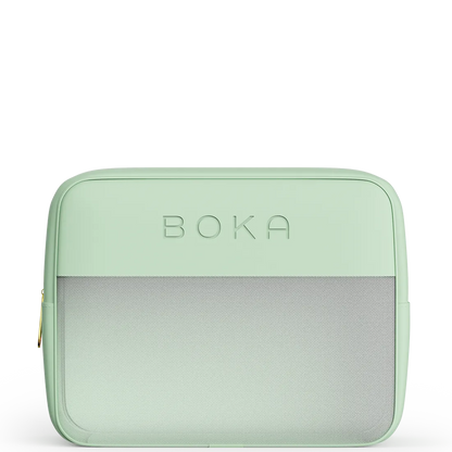 Mint green travel bag with 'Boka' branding on a white background