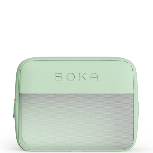 Mint green travel bag with 'Boka' branding on a white background