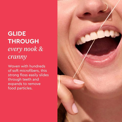 Person using dental floss with text on a pink background