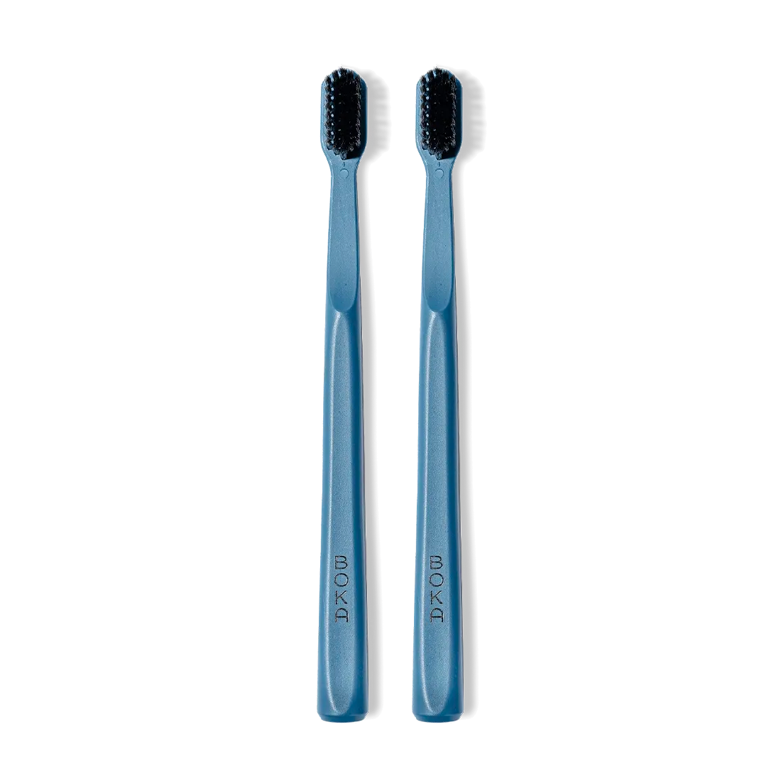 Classic Toothbrush 2-Pack: two blue brushes with charcoal bristles for a gentle clean, side by side.