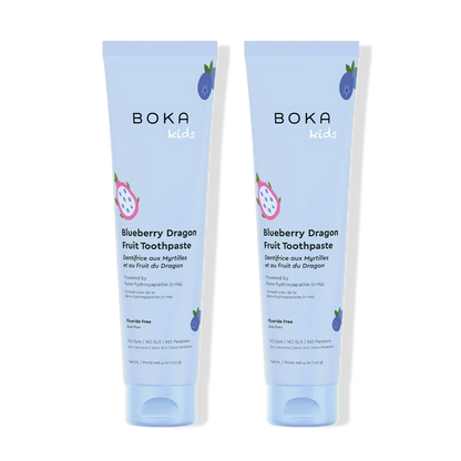 Two tubes of Boka Kids Blueberry Dragon Fruit Toothpaste on a white background