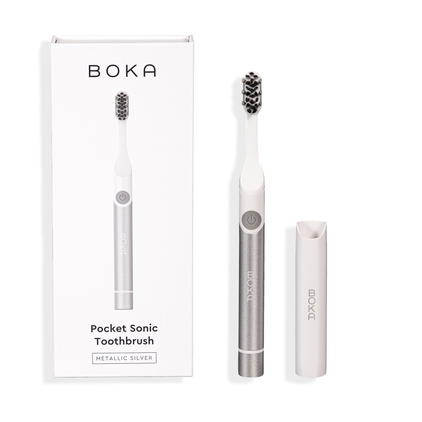 Boka Pocket Electric Toothbrush in metallic silver with Sonic Pulse, box, and travel cap shown.