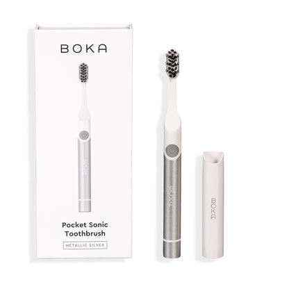 Boka Pocket Electric Toothbrush in metallic silver with Sonic Pulse, box, and travel cap shown.