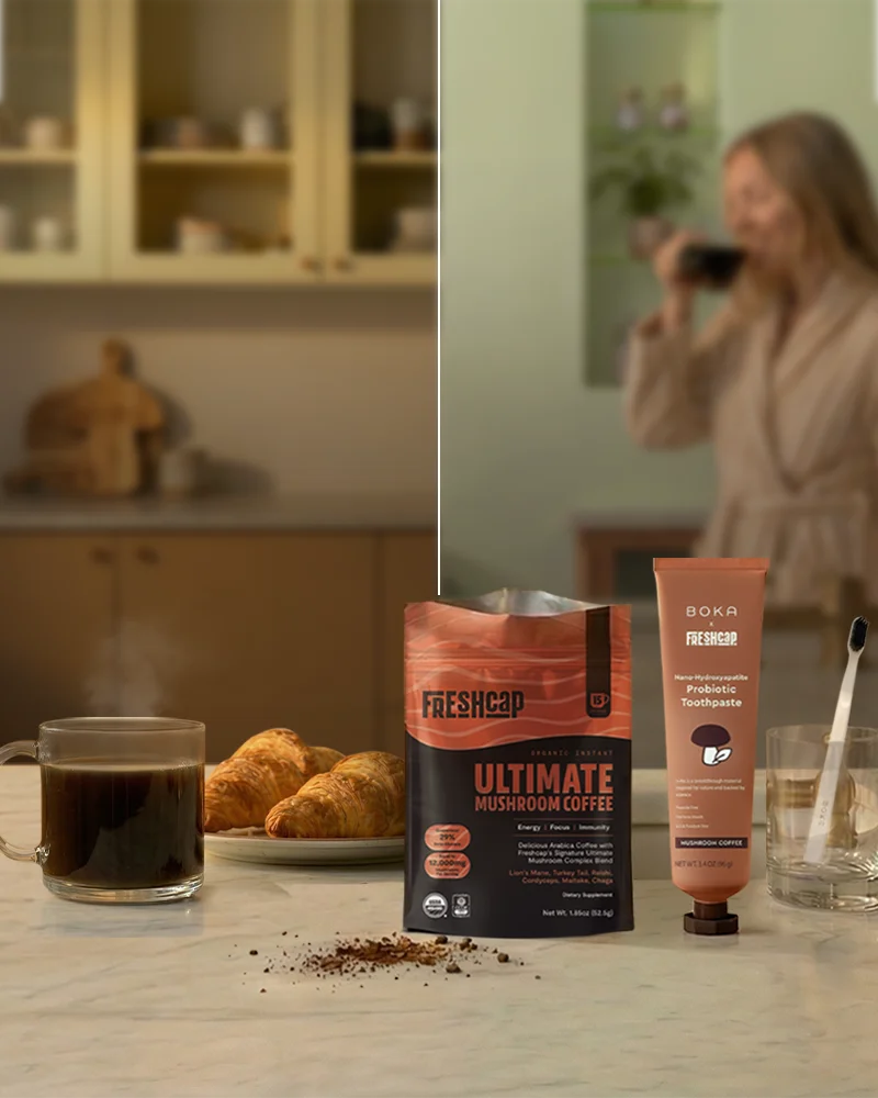 FreshCap Ultimate Mushroom Coffee package on a kitchen counter with a blurred background