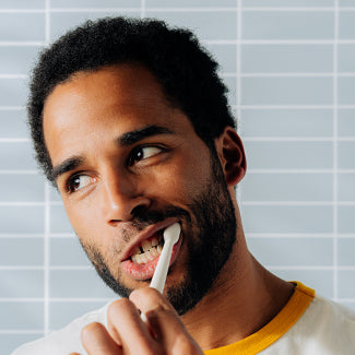 Man brushing teeth