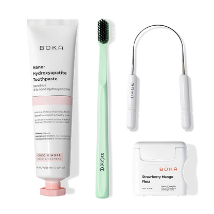 Starter Kit: nano-hydroxyapatite toothpaste, green toothbrush, and strawberry mango floss.
