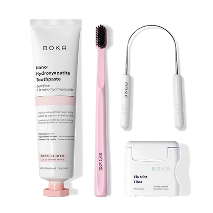 Starter Kit: nano-hydroxyapatite toothpaste, pink brush with charcoal bristles, and tongue cleaner.