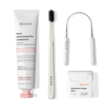Starter Kit with nano-hydroxyapatite toothpaste, charcoal toothbrush, and floss picks.