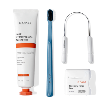 Boka Starter Kit with nano-hydroxyapatite toothpaste, charcoal toothbrush, floss, and tongue scraper.
