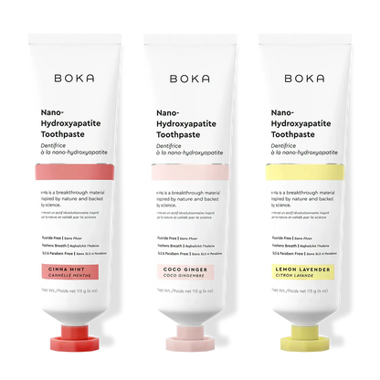 Three tubes of Boka Nano-Hydroxyapatite Toothpaste with different flavors on a white background.