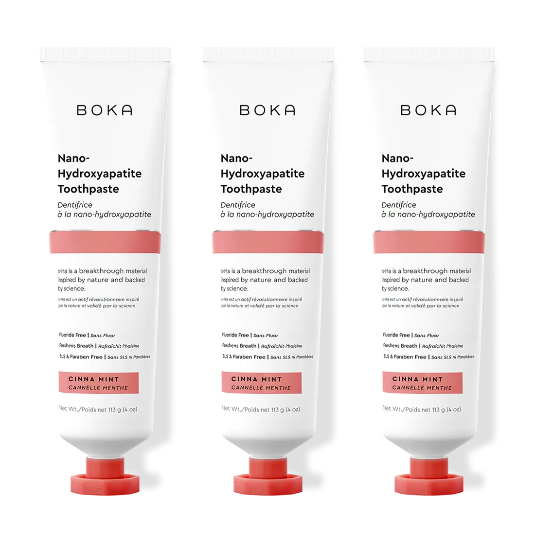 Three tubes of Boka Nano-Hydroxyapatite Toothpaste with cinnamon mint flavor on a white background.