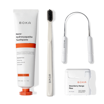 Boka Starter Kit: nano-hydroxyapatite toothpaste, charcoal toothbrush, and floss.