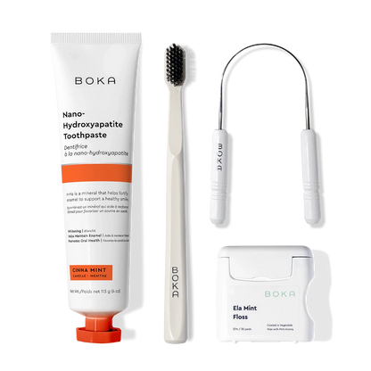Boka Starter Kit displayed, includes nano-hydroxyapatite toothpaste, charcoal-bristle brush, and mint floss.