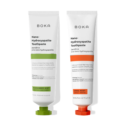 N-Ha Toothpaste 2-Pack with nano-hydroxyapatite whitens and remineralizes teeth on a black background.