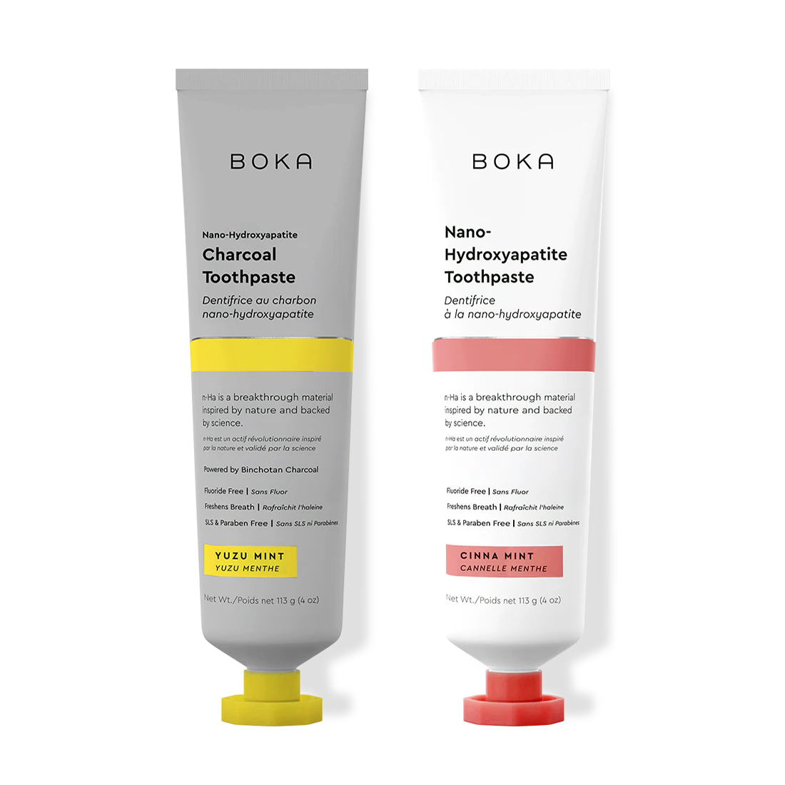 Two Boka toothpaste tubes, one with charcoal flavor and the other with cinnamon flavor, on a white background.