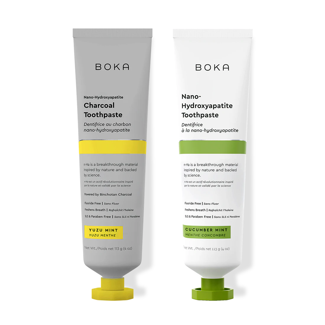 Two Boka toothpaste tubes, one with charcoal flavor and the other with cucumber mint flavor, on a white background.
