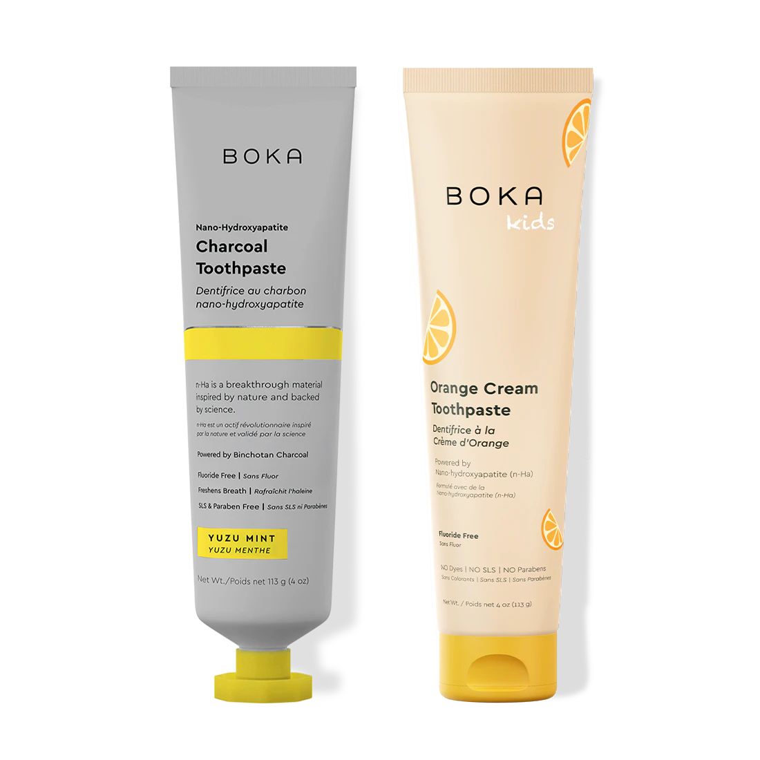 Two Boka toothpaste tubes, one gray and one beige, on a white background.