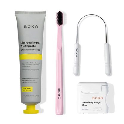 Starter Kit: nano-hydroxyapatite toothpaste, pink brush, tongue cleaner, and strawberry mango floss.