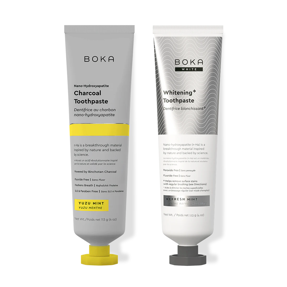 Two Boka toothpaste tubes, one Charcoal and one Whitening, on a white background.
