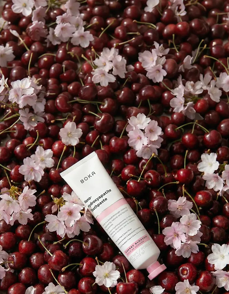 Boka product on a bed of cherries and flowers