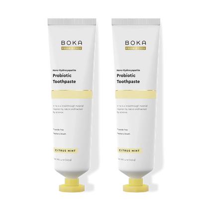 Two tubes of Boka Probiotic Toothpaste on a white background