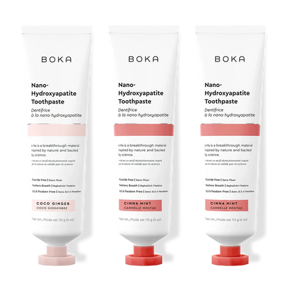 Three tubes of Boka Nano-Hydroxyapatite Toothpaste with different flavors on a white background.