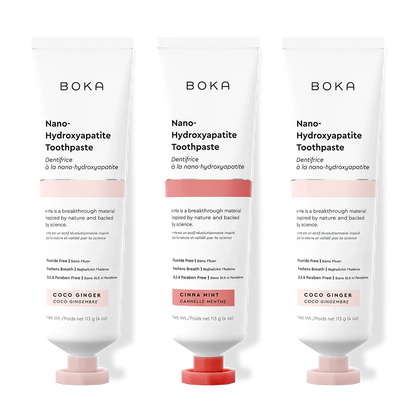 Three tubes of Boka Nano-Hydroxyapatite Toothpaste with different flavors on a white background.