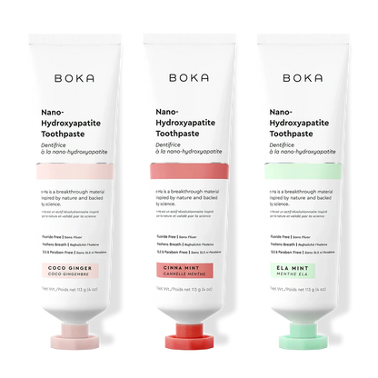 Three tubes of Boka Nano-Hydroxyapatite Toothpaste with different flavors on a white background.