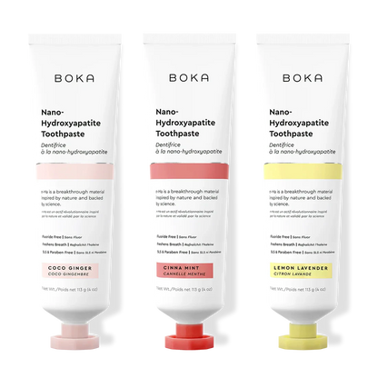 Three tubes of Boka Nano-Hydroxyapatite Toothpaste with different flavors on a white background.
