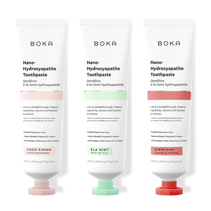 Three tubes of Boka Nano-Hydroxyapatite Toothpaste with different flavors on a white background.