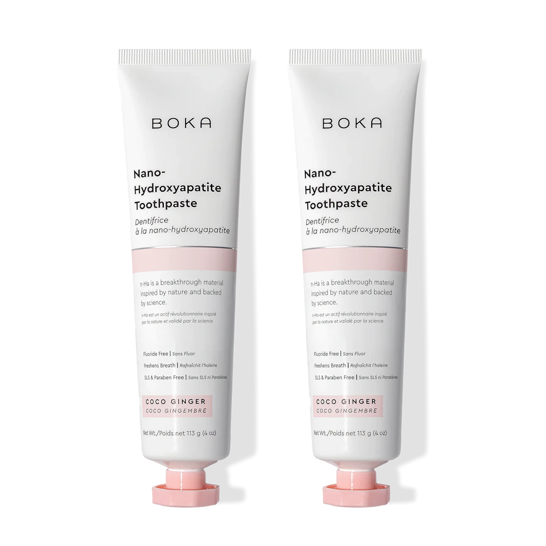 Two tubes of Boka Nano-Hydroxyapatite Toothpaste with pink caps on a white background