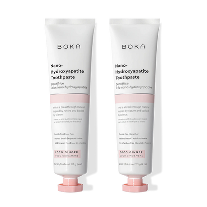 Two tubes of Boka Nano-Hydroxyapatite Toothpaste with pink caps on a white background