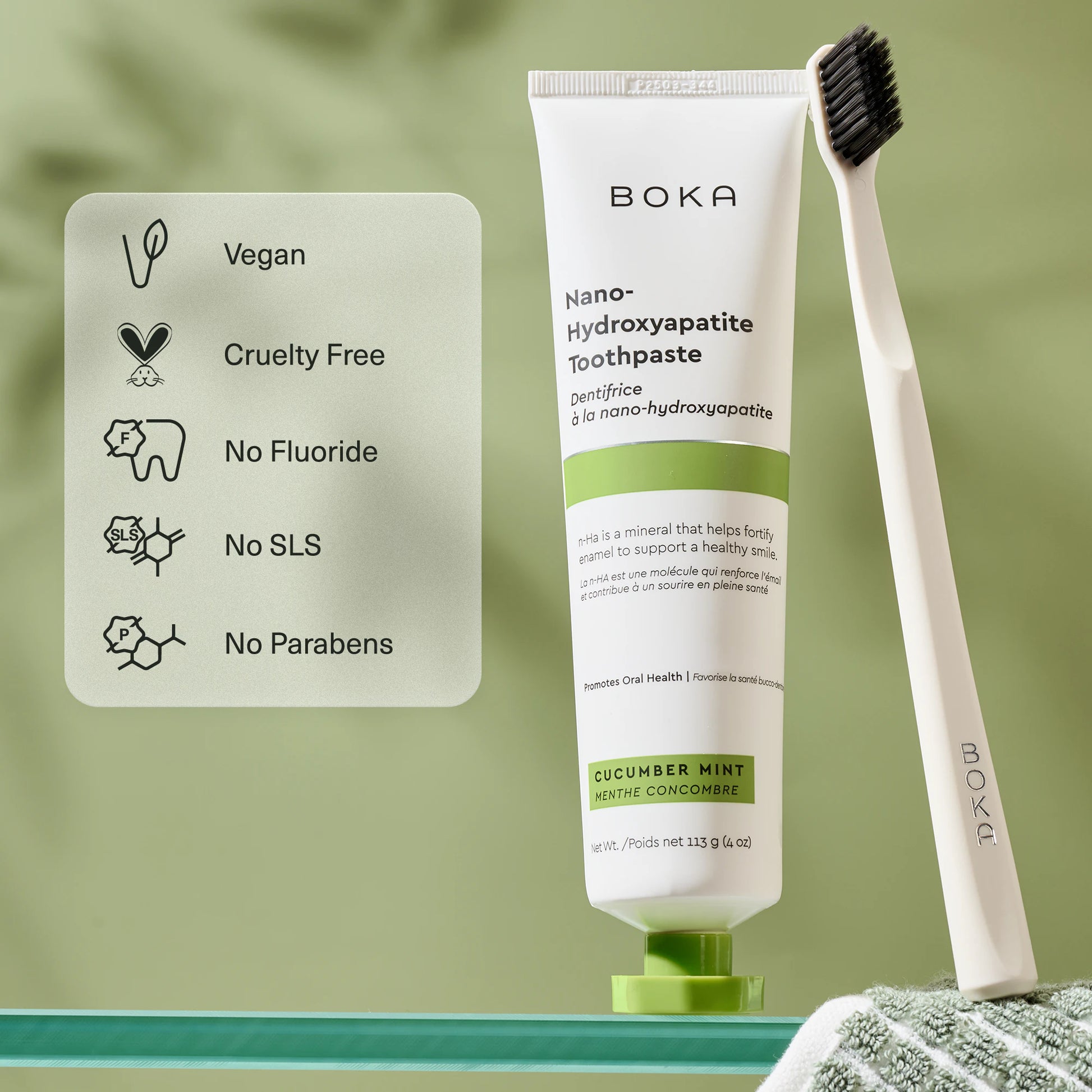 Boka toothpaste tube with a toothbrush on a green background