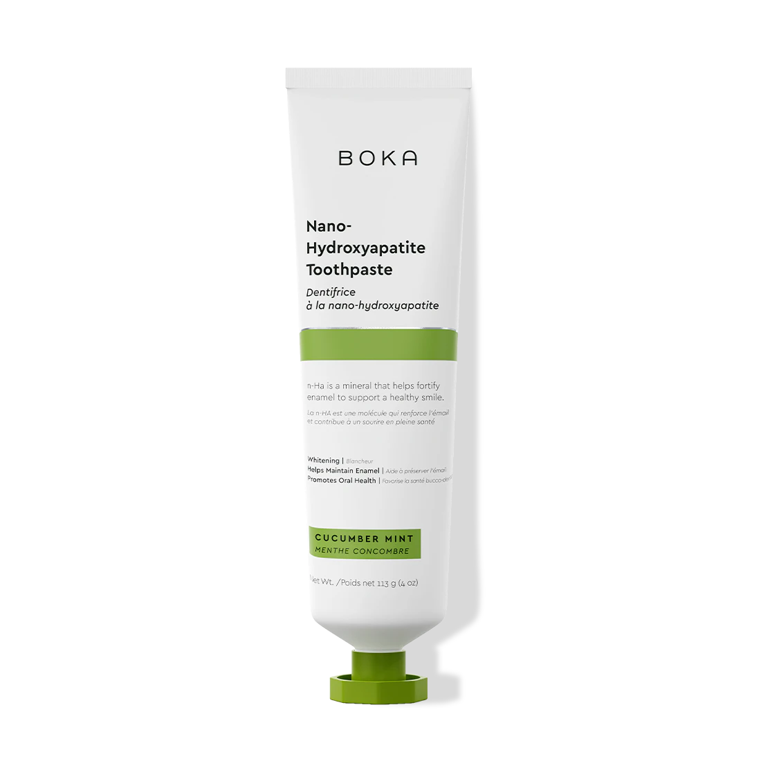A white tube of Cucumber Mint n-Ha Toothpaste (fluoride-free) on a black background.