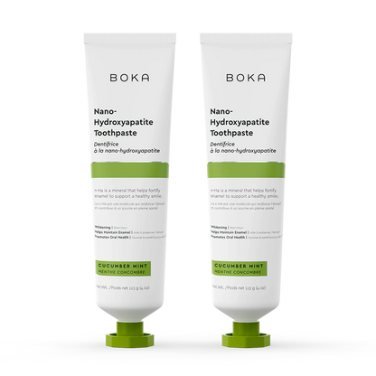Two tubes of Cucumber Mint n-Ha Toothpaste, fluoride-free, standing upright.