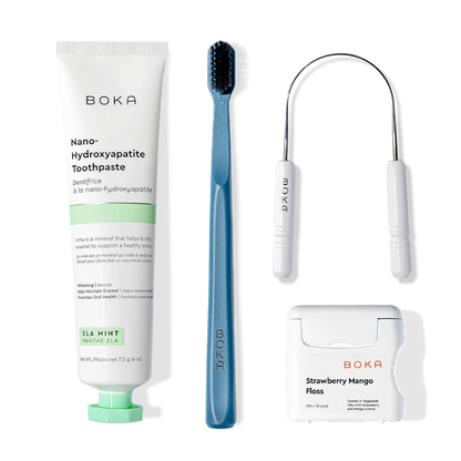 Starter Kit with nano-hydroxyapatite toothpaste, blue toothbrush, floss pick, and fruity dental floss.
