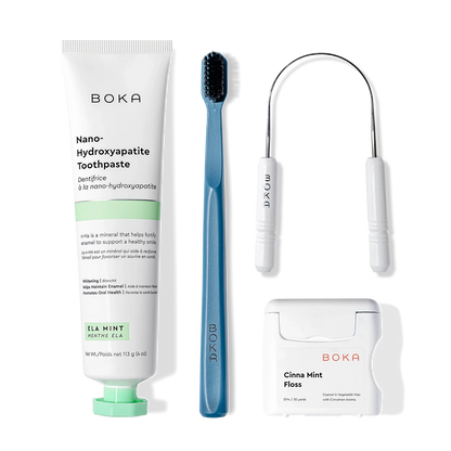 Boka Starter Kit: tongue cleaner, nHa toothpaste, blue charcoal brush, and Cinna Mint floss.