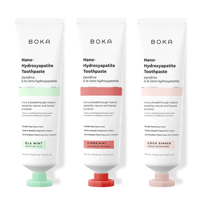 Three tubes of Boka Nano-Hydroxyapatite Toothpaste with different flavors on a white background.